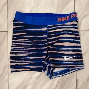 Nike pro spandex small shorts. Dri fit. Blue pink and white